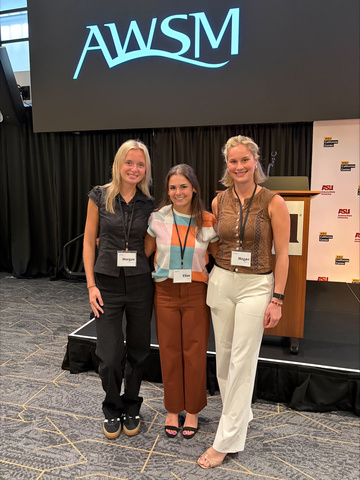 This is a photo of AWSM students Megan Heine, Morgan Burhans, and Elise Gan at the national AWSM conference.