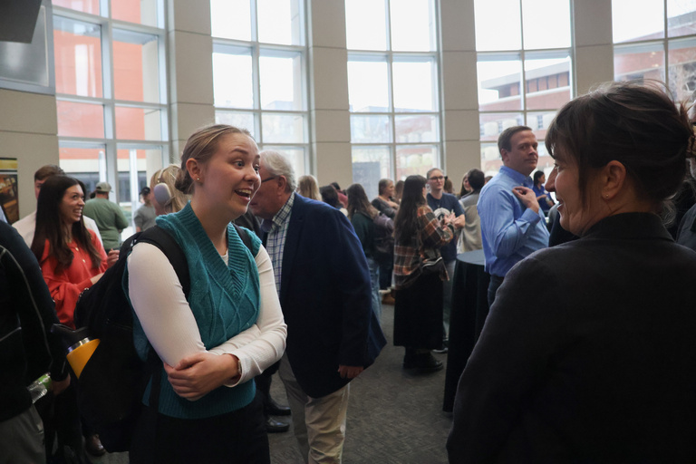 Students and faculty at the student exhibition on Tuesday, April 10, 2025.