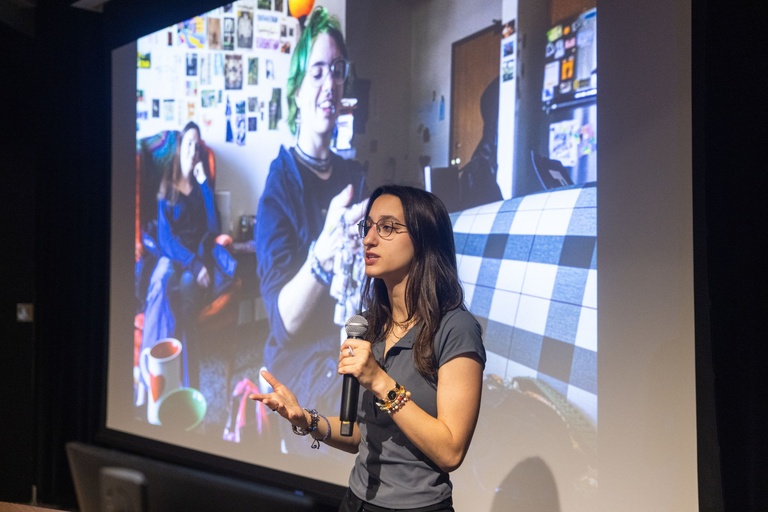 This is a photo of Ava Neumaier talking about a photo she took.
