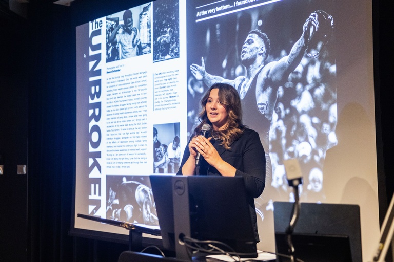 This is a photo of Reece Schrader talking about a photo she took.