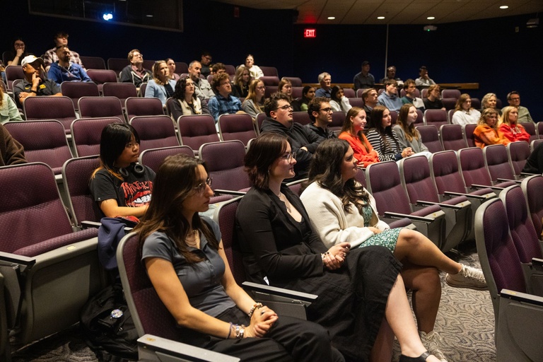 This is an ultrawide shot of the audience attending the Year in Focus Event.