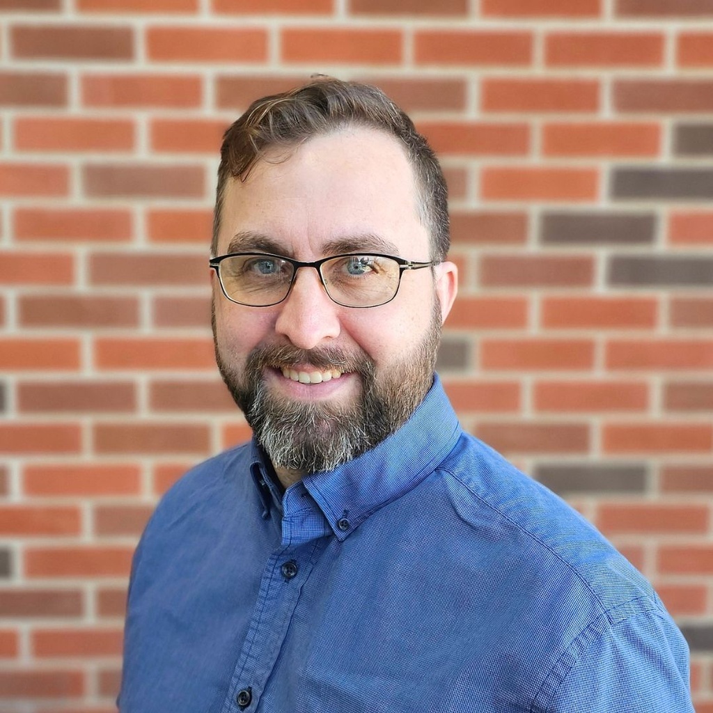 This is a headshot for Gabe Martin.