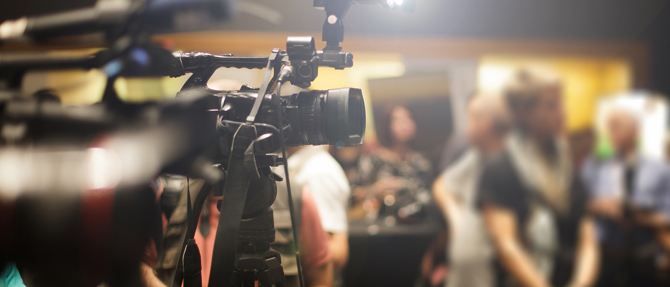 reporters at a press conference
